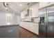 Bright kitchen with granite countertops, stainless steel appliances, and ample storage at 1878 Weston Ln, Tucker, GA 30084