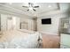 Bedroom with plush carpet, neutral tones, and walk-in closets at 1878 Weston Ln, Tucker, GA 30084