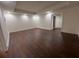 Finished basement with hardwood floors and recessed lighting at 5014 Dovecote Trl, Suwanee, GA 30024