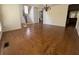 Elegant dining room featuring hardwood floors, chandelier, and wainscoting at 5014 Dovecote Trl, Suwanee, GA 30024