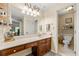 Bathroom vanity with large countertop with a door to a second room at 5018 Old Ivy Rd, Peachtree Corners, GA 30096