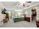 Spacious main bedroom featuring a walk-in closet and two windows for natural light at 5018 Old Ivy Rd, Peachtree Corners, GA 30096