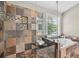 Bathroom with a large tub, tiled shower, and a window for natural light at 672 Red Sunset Cir, Powder Springs, GA 30127