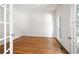 Bright home office featuring hardwood floors and large windows at 672 Red Sunset Cir, Powder Springs, GA 30127