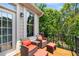 Cozy balcony featuring outdoor seating, ideal for relaxing and enjoying neighborhood views and fresh air at 11271 Calypso Dr, Alpharetta, GA 30009