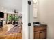 Bathroom with vanity, contrasted with living room at 11271 Calypso Dr, Alpharetta, GA 30009