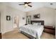 Comfortable bedroom with a neutral color scheme and carpet, offering a cozy retreat at 11271 Calypso Dr, Alpharetta, GA 30009