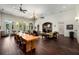 Spacious clubhouse featuring a dining table, seating area, and fireplace at 11271 Calypso Dr, Alpharetta, GA 30009