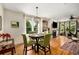 Cozy dining area with hardwood floors and natural light at 11271 Calypso Dr, Alpharetta, GA 30009