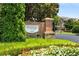 Westwood Park sign with colorful flowers and lush greenery at 11271 Calypso Dr, Alpharetta, GA 30009