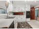 Cozy kitchen featuring white countertops, a double sink, and a wall mounted oven at 1194 Robert Ln, Marietta, GA 30062