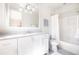 Classic bathroom with white vanity, subway tile, and a shower-tub combo at 144 Northern Ave, Decatur, GA 30030