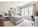 Bright bedroom with three windows and a neutral color palette at 144 Northern Ave, Decatur, GA 30030