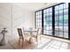 Bright breakfast nook featuring hardwood floors and oversized windows at 144 Northern Ave, Decatur, GA 30030