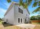 The backyard features a patio, lush greenery, and a well-maintained lawn at 2470 Arnold Mill Rd, Lawrenceville, GA 30044
