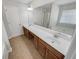 Bright bathroom features dual sinks, large mirrors, and a separate shower at 2470 Arnold Mill Rd, Lawrenceville, GA 30044