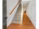 Entryway with wood floors and stairway to the second floor at 2470 Arnold Mill Rd, Lawrenceville, GA 30044
