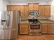 Well-equipped kitchen with stainless steel appliances and ample cabinet space at 2470 Arnold Mill Rd, Lawrenceville, GA 30044