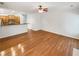 Living room area with hardwood floors opening to the kitchen at 2470 Arnold Mill Rd, Lawrenceville, GA 30044
