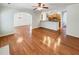 Spacious living area with hardwood floors connecting to the dining room and kitchen at 2470 Arnold Mill Rd, Lawrenceville, GA 30044