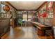 Spacious game room features a pinball machine, shuffleboard table, and sports memorabilia decorations at 7048 Bennington Ln, Cumming, GA 30041
