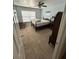 Comfortable bedroom featuring a ceiling fan, plush carpet and a window allowing natural light at 1038 Island View Ct, Buford, GA 30518