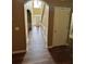 Spacious foyer with beautiful hardwood floors and views of the front door at 1038 Island View Ct, Buford, GA 30518