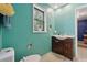 Bathroom with a sink and vanity, with a toilet and window at 5360 Fieldgreen Dr, Stone Mountain, GA 30088