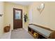 Inviting entryway with a bench, tile floors, and ample space for greeting guests and storing belongings at 5360 Fieldgreen Dr, Stone Mountain, GA 30088