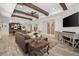 Spacious basement with a living area and pool table at 6325 Haddington Ln, Suwanee, GA 30024
