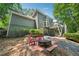 Spacious backyard featuring a fire pit and multi-level deck at 1518 Maplewood Ct, Woodstock, GA 30189