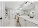 Spacious bathroom featuring double vanity, updated fixtures, and walk-in shower at 1518 Maplewood Ct, Woodstock, GA 30189