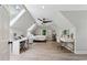 Bright bedroom features vaulted ceiling, dual skylights, and dedicated vanity areas at 1518 Maplewood Ct, Woodstock, GA 30189