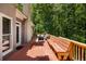 Lovely outdoor deck with comfortable seating and a picturesque wooded backdrop, perfect for relaxation at 410 Waterridge Ct, Sandy Springs, GA 30350