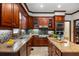 Updated kitchen with granite counters, tile backsplash, and stainless steel appliances at 410 Waterridge Ct, Sandy Springs, GA 30350