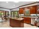 Gourmet kitchen with custom cabinetry, granite countertops, and stainless steel appliances at 410 Waterridge Ct, Sandy Springs, GA 30350