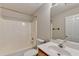 Bathroom with a tub, sink, and mirror at 430 Tara Oaks Ct, Lawrenceville, GA 30043