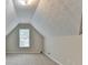 Spacious bedroom featuring neutral walls, plush carpet, and a sunlit window at 430 Tara Oaks Ct, Lawrenceville, GA 30043