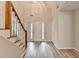 Bright entryway with light gray walls, white trim, and stylish laminate flooring at 430 Tara Oaks Ct, Lawrenceville, GA 30043