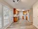 Bright kitchen with wood cabinets, stainless appliances, and laminate flooring at 430 Tara Oaks Ct, Lawrenceville, GA 30043