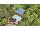 Aerial view of community amenities featuring a pool, tennis courts, and playground at 2455 Stonevalley Ln, Cumming, GA 30041