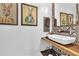 Chic powder room with stylish vessel sink and decorative wall art at 2455 Stonevalley Ln, Cumming, GA 30041