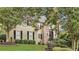 Charming two-story home featuring a stone facade and manicured landscaping at 2455 Stonevalley Ln, Cumming, GA 30041