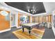 Basement game room featuring a pool table, distinctive decor, and neutral colored walls to enhance the room at 2455 Stonevalley Ln, Cumming, GA 30041