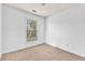 Bedroom featuring neutral walls, carpet, and a window with blinds at 3028 Sw Deerborne Court Sw Ct, Atlanta, GA 30331