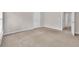 Neutral bedroom shows a carpeted floor and a nearby doorway at 3028 Sw Deerborne Court Sw Ct, Atlanta, GA 30331