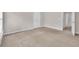 Bedroom featuring neutral walls, carpet, and a closet door leading to another room at 3028 Sw Deerborne Court Sw Ct, Atlanta, GA 30331