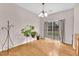 Cozy dining area with hardwood floors and sliding glass doors leading to the backyard at 3028 Sw Deerborne Court Sw Ct, Atlanta, GA 30331
