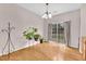 Cozy dining area with hardwood floors and a sliding glass door to the backyard at 3028 Sw Deerborne Court Sw Ct, Atlanta, GA 30331