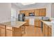 Functional kitchen with wood cabinets, countertops, and modern appliances at 3028 Sw Deerborne Court Sw Ct, Atlanta, GA 30331